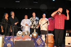 End-of-the-concert.-Campinas-Brazil-2004-left-to-right-Poovalur-Sriji-Adam-Rudolph-Pandit-Swapan-Chaudhuri-Austin-Wrinkle-Randy-Gloss-Houman.jpg